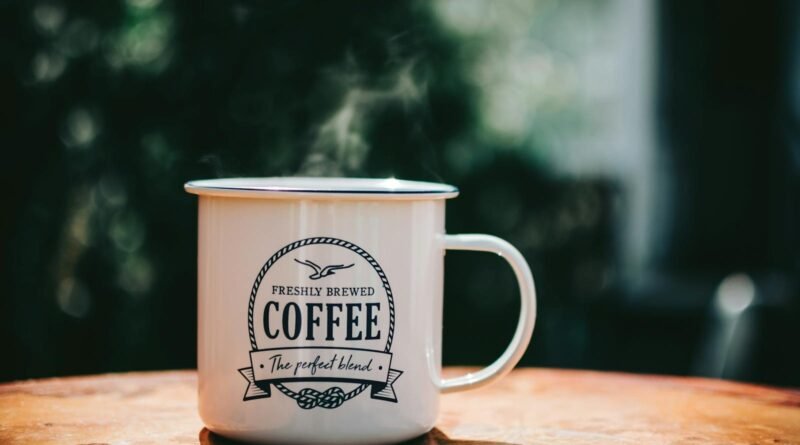 White Coffee Mug on Brown Surface