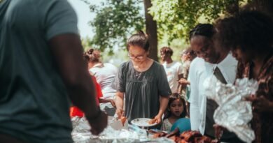 People Taking Food on Plate at Garden Party