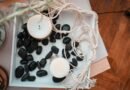 Home decoration with candles and black stones