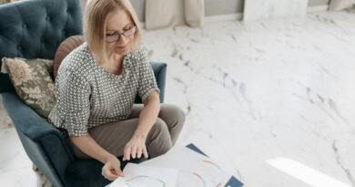 Woman Reading Horoscope in a Living Room