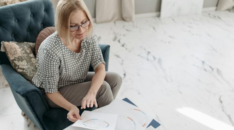 Woman Reading Horoscope in a Living Room